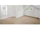 Bedroom featuring round window and doorway to a bathroom at 3492 Newtons Crest Cir, Snellville, GA 30078