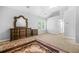 Bedroom with neutral walls, carpet, a small window, and a white ceiling fan at 3492 Newtons Crest Cir, Snellville, GA 30078