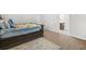 Bedroom features a rug and a doorway to the bathroom at 3492 Newtons Crest Cir, Snellville, GA 30078
