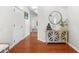 Charming foyer with hardwood floors and console table at 3492 Newtons Crest Cir, Snellville, GA 30078