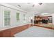 Open-concept living room with plenty of natural light open to the kitchen at 3492 Newtons Crest Cir, Snellville, GA 30078