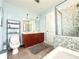A full bathroom includes double vanity, toilet, and shower and tub at 3655 Peachtree Ne Rd # 304, Atlanta, GA 30319