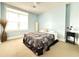 Bedroom features a comfortable bed and natural light from window at 3655 Peachtree Ne Rd # 304, Atlanta, GA 30319
