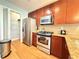 Updated kitchen with stainless steel appliances, granite countertops, and ample cabinet space at 3655 Peachtree Ne Rd # 304, Atlanta, GA 30319