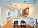 Modern kitchen with barstool seating, stainless appliances, and stylish pendant lighting at 3655 Peachtree Ne Rd # 304, Atlanta, GA 30319