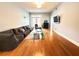 Spacious living room with hardwood floors and access to outdoor area at 3655 Peachtree Ne Rd # 304, Atlanta, GA 30319