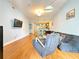 Bright living room with hardwood floors, TV and comfortable seating at 3655 Peachtree Ne Rd # 304, Atlanta, GA 30319
