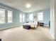 Large bedroom with ample natural light, carpet flooring, and neutral decor at 3655 Peachtree Ne Rd # 304, Atlanta, GA 30319