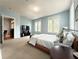 Comfortable main bedroom with carpet floors, natural light, and modern decor at 3655 Peachtree Ne Rd # 304, Atlanta, GA 30319