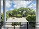 Balcony view showcasing lush greenery and a bustling street, providing an urban retreat at 3655 Peachtree Ne Rd # 304, Atlanta, GA 30319