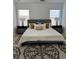 Comfortable bedroom with modern furnishings and carpet at 4540 Cold Spring Ct, Cumming, GA 30041