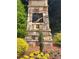 Stone monument sign at James Creek community entrance with manicured landscaping at 4540 Cold Spring Ct, Cumming, GA 30041
