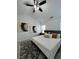 A main bedroom with a ceiling fan and vaulted ceiling, plus decorative artwork at 4540 Cold Spring Ct, Cumming, GA 30041