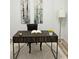 Modern office with hardwood floors, a stylish wooden desk, and a decorative gold lamp at 4540 Cold Spring Ct, Cumming, GA 30041