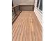 View of the wood patio deck with wood and iron railings at 4540 Cold Spring Ct, Cumming, GA 30041