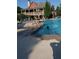 Community pool with a lifeguard stand and plenty of space to relax at 4540 Cold Spring Ct, Cumming, GA 30041