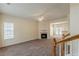 Inviting living room with a fireplace, large windows, and a neutral color palette at 5680 Hampton Ct, Atlanta, GA 30349