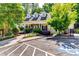 A community clubhouse with manicured landscaping, and accessible parking at 2721 Maeve Ct, Dacula, GA 30019