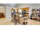Bright kitchen with stainless steel appliances, granite counters, and a central island with seating at 2721 Maeve Ct, Dacula, GA 30019