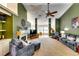 Spacious living room with high ceilings, a fireplace, and comfortable seating arrangements at 2721 Maeve Ct, Dacula, GA 30019