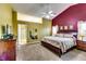 Spacious main bedroom with high ceilings, carpet, and a serene ensuite bathroom entrance at 2721 Maeve Ct, Dacula, GA 30019