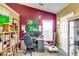 Home office with carpeted floors, natural light and mixed paint on the walls at 2721 Maeve Ct, Dacula, GA 30019