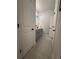 Hall bathroom features a vanity with gray cabinetry and a dark countertop at 4736 Landing Water Path, Buford, GA 30519