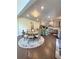 Open dining area with an oval table and chairs conveniently located next to the kitchen at 4736 Landing Water Path, Buford, GA 30519