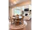 Dining room features an open-concept design and connects to the living room at 4736 Landing Water Path, Buford, GA 30519
