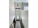 Grand foyer with high ceilings, chandelier, and staircase at 4736 Landing Water Path, Buford, GA 30519