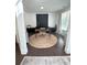 Home office featuring built-in cabinets, a desk, and a circular rug at 4736 Landing Water Path, Buford, GA 30519