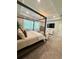 A spacious main bedroom features a decorative chandelier, sitting area, and a four-poster bed at 4736 Landing Water Path, Buford, GA 30519