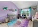 Charming bedroom with vaulted ceiling and a crib perfect for a  at 1892 Ivy View Walk, Loganville, GA 30052