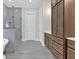 Modern bathroom featuring a glass shower, soaking tub, and dark wood cabinets at 33 Cedar Gate Ln, Kingston, GA 30145