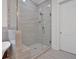 Bathroom showcasing a glass enclosed tiled shower with a built in seat at 33 Cedar Gate Ln, Kingston, GA 30145