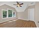Bedroom with natural light, ceiling fan, vaulted ceiling, hardwood floors and trim at 33 Cedar Gate Ln, Kingston, GA 30145