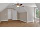 Spacious bedroom featuring hardwood floors, recessed lighting, and windows with natural light at 33 Cedar Gate Ln, Kingston, GA 30145