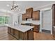 Gourmet kitchen featuring a center island, custom cabinetry, and modern lighting at 33 Cedar Gate Ln, Kingston, GA 30145
