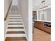 Kitchen features stainless steel appliances, wood cabinets and hardwood floors at 33 Cedar Gate Ln, Kingston, GA 30145