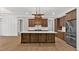 Spacious kitchen with wood cabinets, stainless steel appliances, and a large center island at 33 Cedar Gate Ln, Kingston, GA 30145