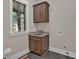 Laundry room with wooden sink cabinets and a utility sink at 33 Cedar Gate Ln, Kingston, GA 30145