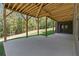 Covered patio with an outdoor space perfect for entertaining and features an entrance to the yard at 33 Cedar Gate Ln, Kingston, GA 30145