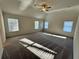 Spacious carpeted bedroom features abundant natural light and a ceiling fan at 3964 Riverchess Lot#157 Sw Dr, Atlanta, GA 30331