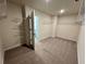 Spacious walk-in closet with adjustable wire shelving and neutral carpeting at 3964 Riverchess Lot#157 Sw Dr, Atlanta, GA 30331
