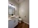 Modern half bath featuring vessel sink and updated fixtures at 655 Wellingborough Ct, Alpharetta, GA 30005