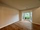 Bright living room featuring hardwood floors and a bay window at 655 Wellingborough Ct, Alpharetta, GA 30005