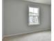 Bedroom featuring a bright window allowing natural light at 1603 Maston Rd, Auburn, GA 30011