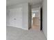 An inviting bedroom with closet and doorway at 1603 Maston Rd, Auburn, GA 30011