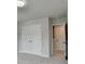 A naturally lit bedroom has a closet and a doorway at 1603 Maston Rd, Auburn, GA 30011