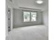 Bedroom featuring bright window allowing natural light at 1603 Maston Rd, Auburn, GA 30011